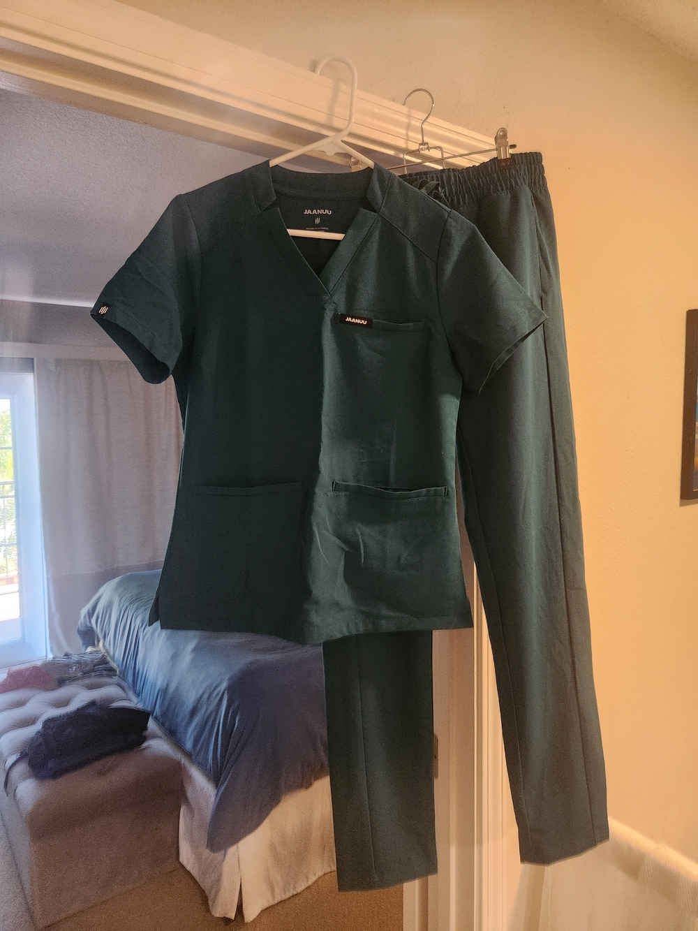 Jaanuu Women's Scrub Set in Green. XS scrub top, XS/Tall scub pant